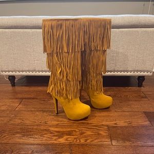 Yellow fringe knee high boots